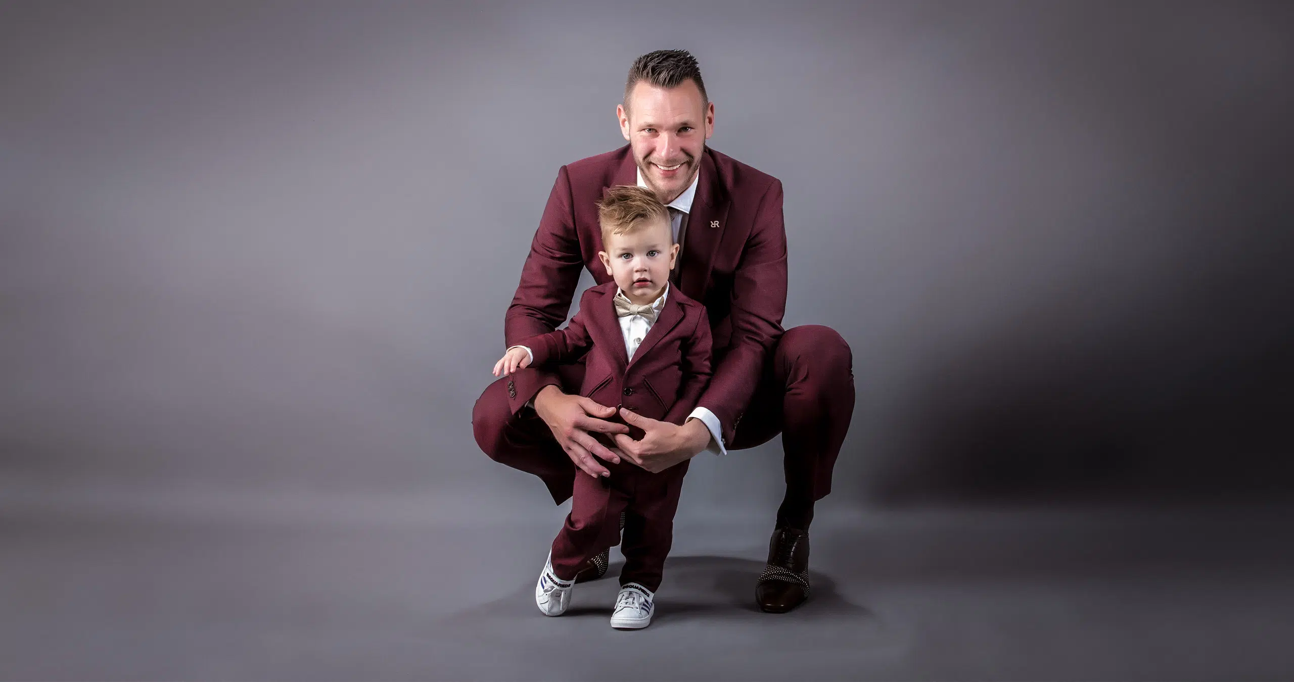 Erwin Mulder en zijn zoon in een trouwpak van Rietbergh